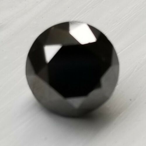 AAA Black Diamond , 1.40 Carats Round,  1 piece clean on table.