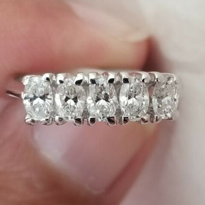 Oval Diamond Rings, .60 H VS2 Carat Diamond ,14k 2.2gr. White Gold, size 5